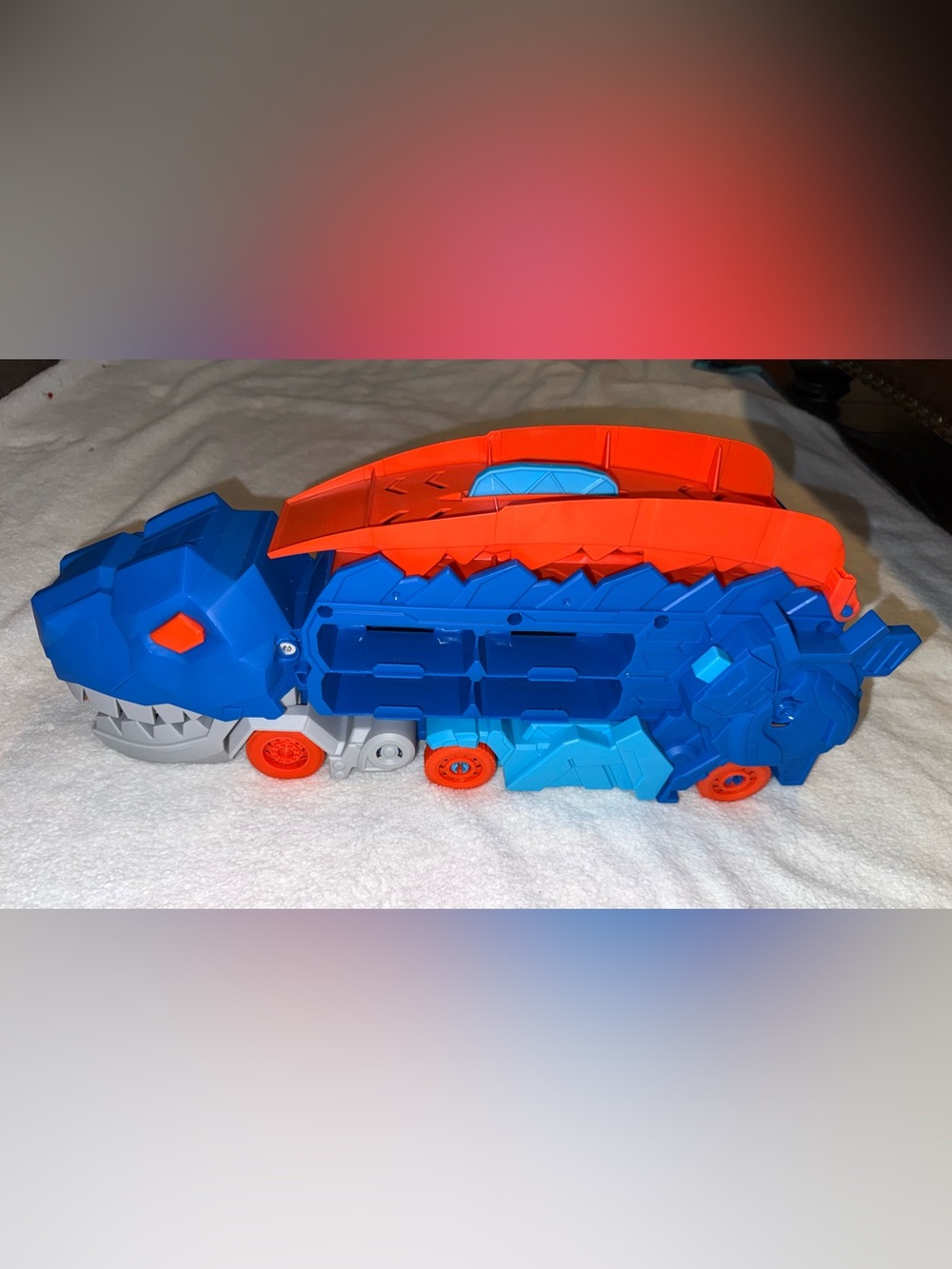 Hot Wheels City Ultimate T-Rex Transporter, large truck shaped like a dinosaur